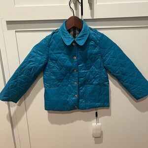 Burberry Mini Pirmont quilted coat. 
BNWT
Size 6
Light Turquoise